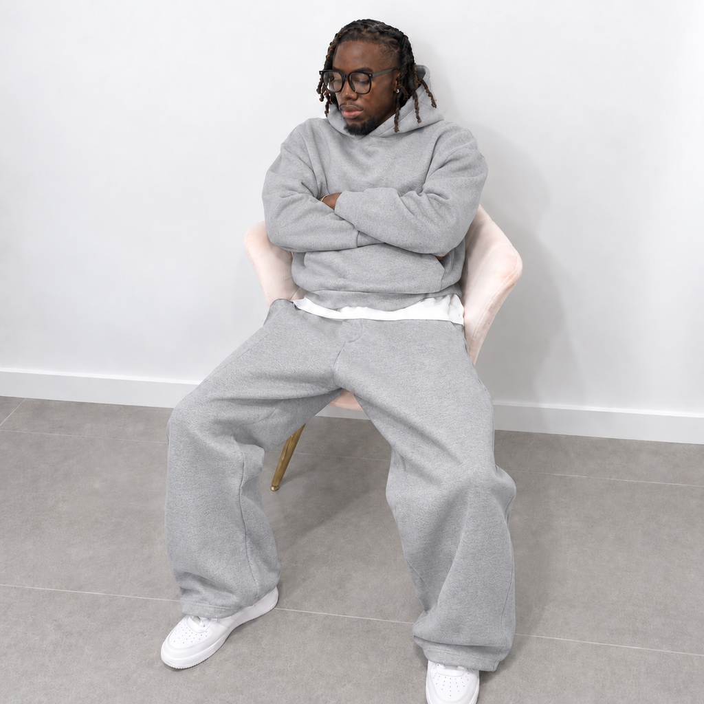 Grey men's jogging set with trousers and hoodie