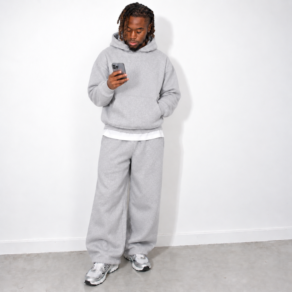Grey men's jogging set with trousers and hoodie