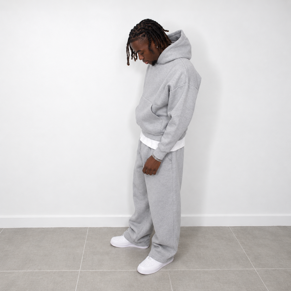 Grey men's jogging set with trousers and hoodie