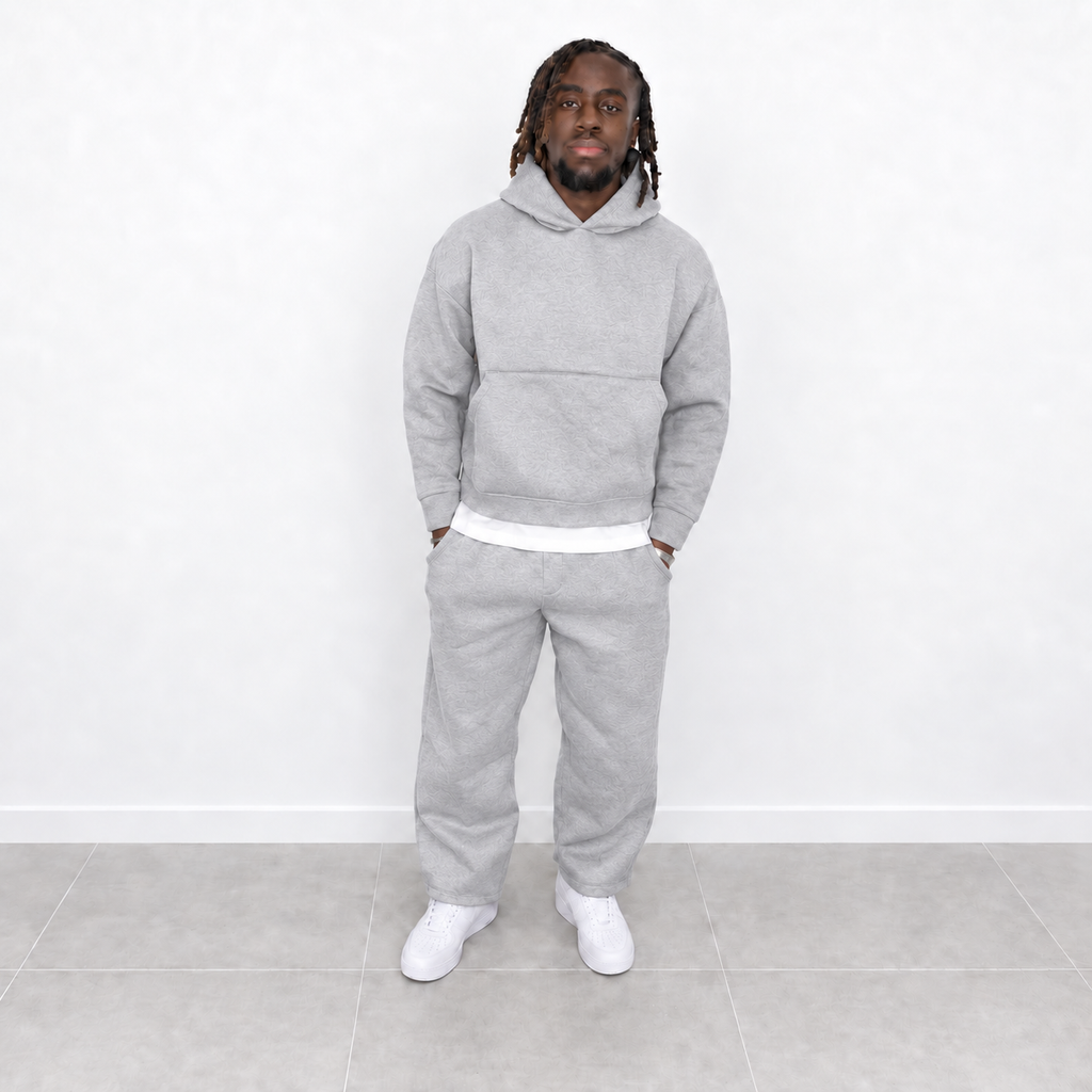 Grey men's jogging set with trousers and hoodie